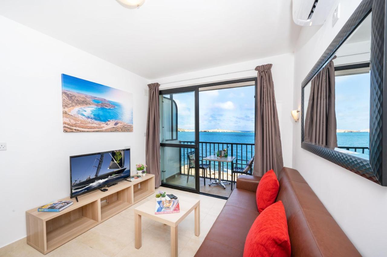 Islet Promenade Seafront 1 Bedroom Apartment With Sea View Balcony By Getawaysmalta خليج سانت بول المظهر الخارجي الصورة