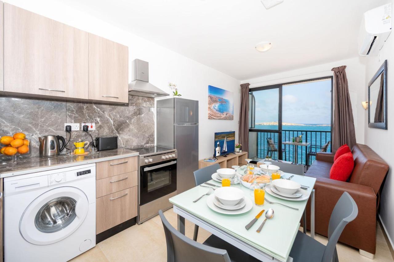 Islet Promenade Seafront 1 Bedroom Apartment With Sea View Balcony By Getawaysmalta خليج سانت بول المظهر الخارجي الصورة