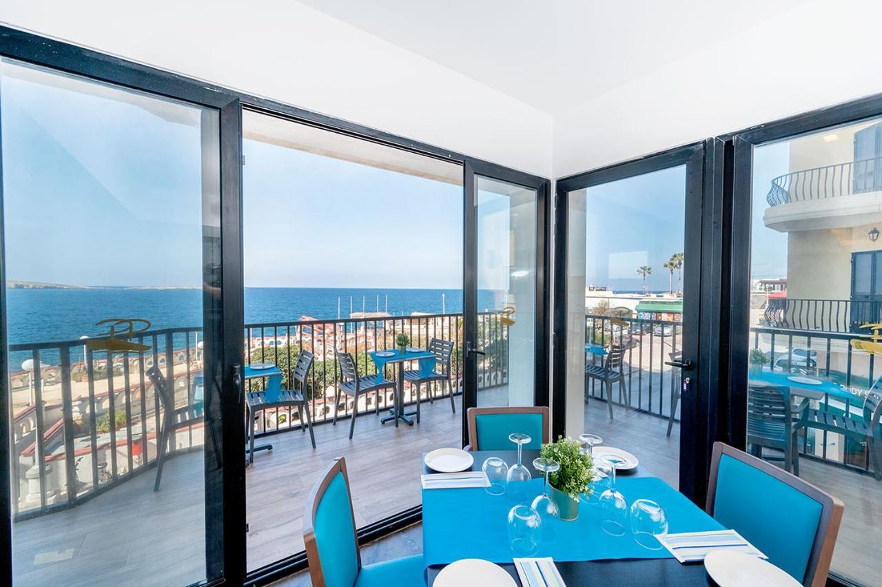 Islet Promenade Seafront 1 Bedroom Apartment With Sea View Balcony By Getawaysmalta خليج سانت بول المظهر الخارجي الصورة